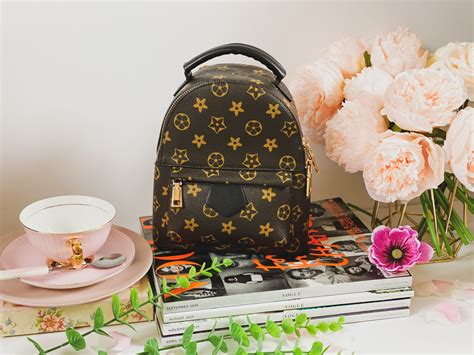 louis vuitton lock me backpack dupe